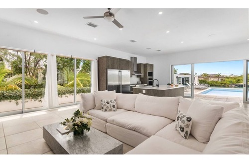Leeward Settlement House | Waterfront Luxury Villa with Optional Boat and Beach Access Just Steps Away
