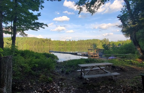 Bryant Pond Cabin | Waterfront and Mountain view a HOT TUB, Unlimited KARAOKE and Pet Friendly!