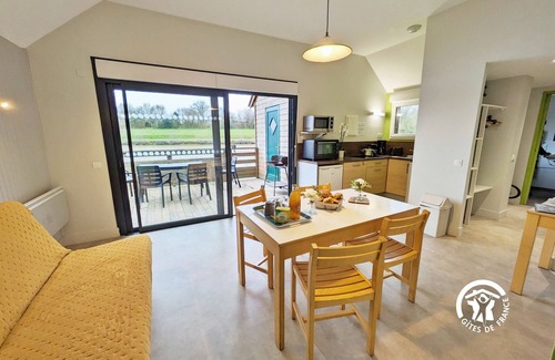 Villiers-Charlemagne Cottage | Waterfront Chalet with Private Fishing, Terrace, and Games, Sleeps 5-7