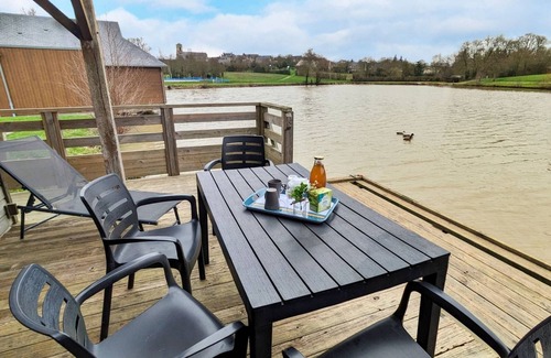 Villiers-Charlemagne Cottage | Waterfront Chalet with Private Fishing, Terrace, and Games, Sleeps 5-7