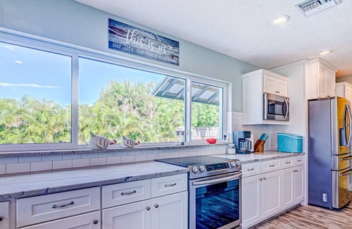 Cocoa Isles House | Waterfront home with saltwater pool, private dock, central AC & washer/dryer