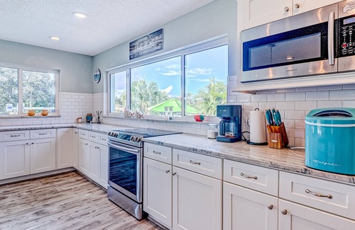 Cocoa Isles House | Waterfront home with saltwater pool, private dock, central AC & washer/dryer