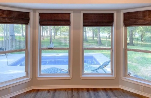 Mineola House | Waterfront Lake House with a pool