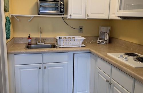 Atlantic Beach Apartment | Waterfront, Poolside, King Bd, Ground-Floor, & WiFi