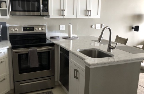 Charlevoix Condo | Waterfront Setting w/Top-Floor Views Overlooking Lake Charlevoix