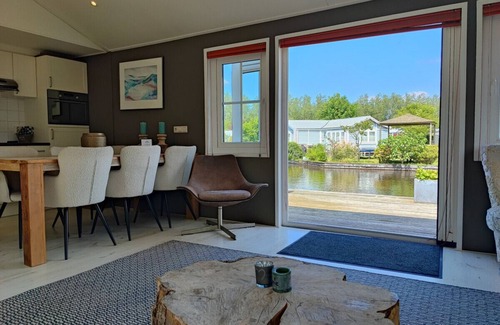 Loosdrecht House | Waterfront tranquility and comfort. Free parking.