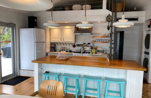 Georgetown Cottage | Waterfront, west facing, modernized fisherman’s cottage perched on the water.