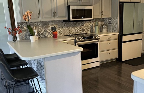 Mount Morris Township House | Welcome Home - quiet location - lots of trees - your stop to North Michigan