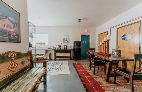 Southside House | Whimsical Glamping Loft + Airstream by Meow Wolf