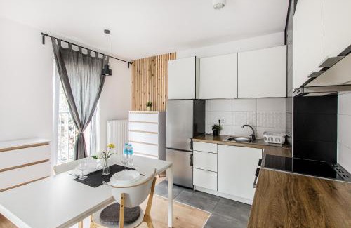 Krzyki Apartment | White Apartment With Terrace