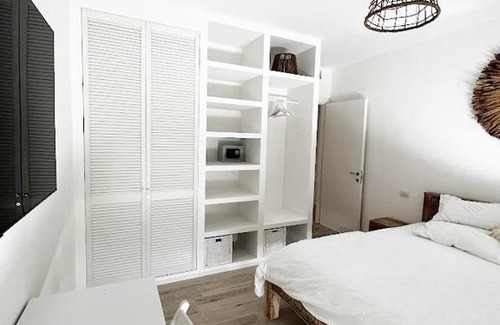 Fogliano Marina Apartment | White Beach Front Suite - 2 Bedroom