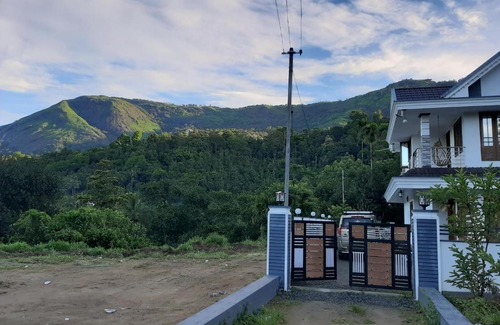 Devikolam House | White Petals -3 BHK Homestay Munnar - Available For Indian Nationals Only