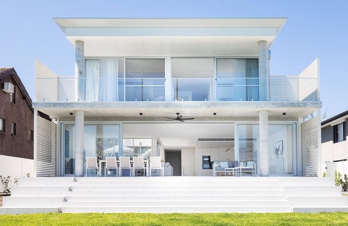 Corlette House | Whitehouse On The Water - Palatial Home on Idyllic Beach