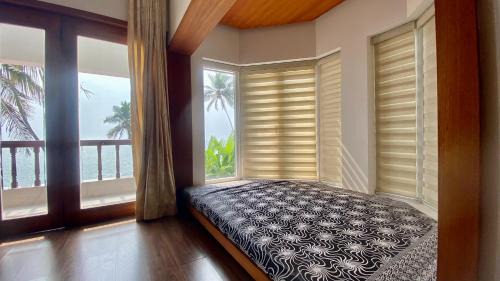 Kannur House | Willo Stays On the beach Sea view Ocean Hues holiday home