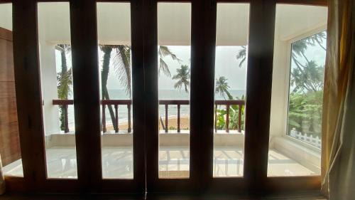 Kannur House | Willo Stays On the beach Sea view Ocean Hues holiday home