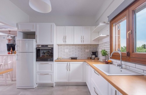 Kalivia Poliyirou Villa | Windmill Villa, a beachfront villa with private pool, for relaxing holidays