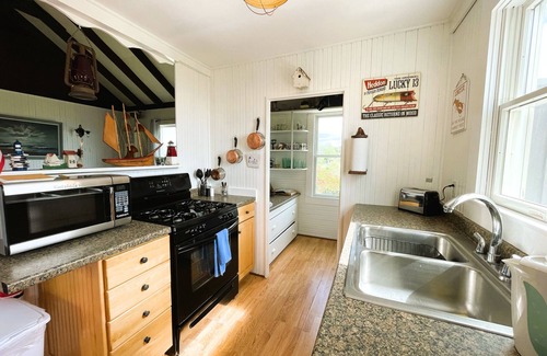 Campground Landing Cottage | Windswept on Campground Beach