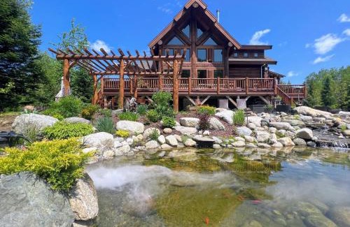 Bretton Woods House | WML stunning log home in Bretton Woods, AC, 2-person Jacuzzi, indoor and outdoor fireplaces, & more!