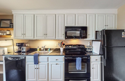 Rosario Condo | Wonderful escape with water access, three balconies, W/D, & gas fireplace