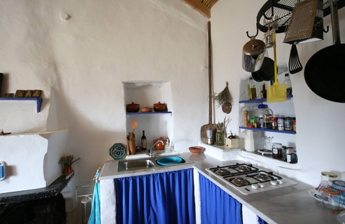 Karvelas House | Wonderful old stone house, with a view on sea and mountains