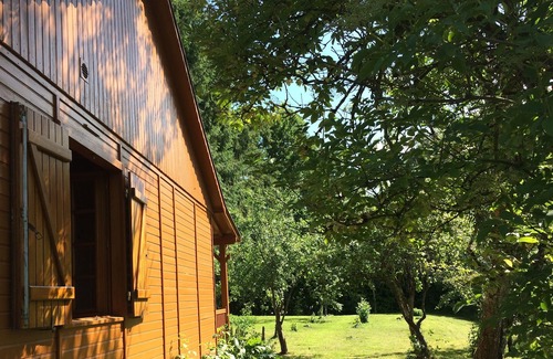 Marillet House | WOOD FRAME HOUSE WITH TERRACE AND LAND TREES