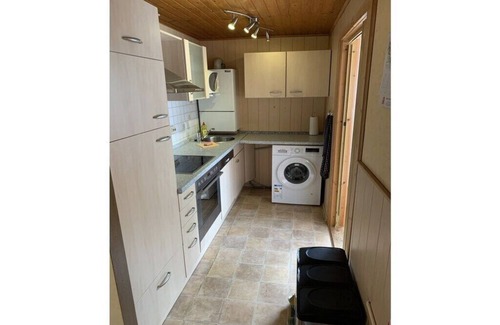 Waldsiedlung Romerstraße House | Wooden holiday home with winter garden