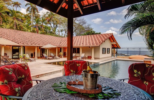 Playa Flamingo House | World Class Flamingo Beachfront Villa with 5 Poolside Bedroom Suites!