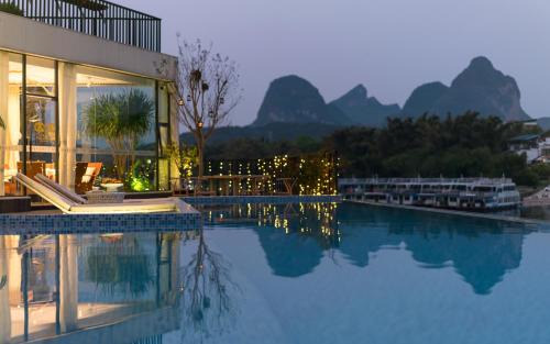 Yangshuo Hotel | Xitang River View Holiday Motel