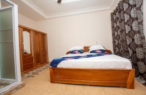 Kumasi House | Yaa Asantewaa Inn