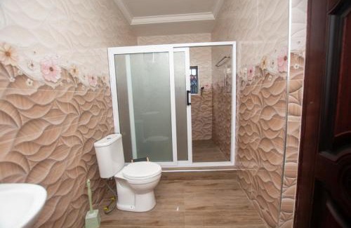 Kumasi House | Yaa Asantewaa Inn