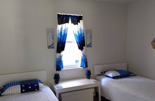 Central Huron House | Year Round Woodland, "Goderich Guesthouse"