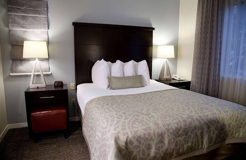 San Bruno Resort | Your Home Away From Home! Onsite Pool, Free Breakfast, Parking