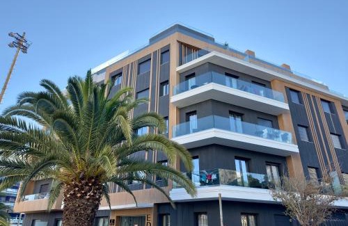 Athens Apartment | Zefyros Home - Luxe Stay with Shared Pool & Gym by TT