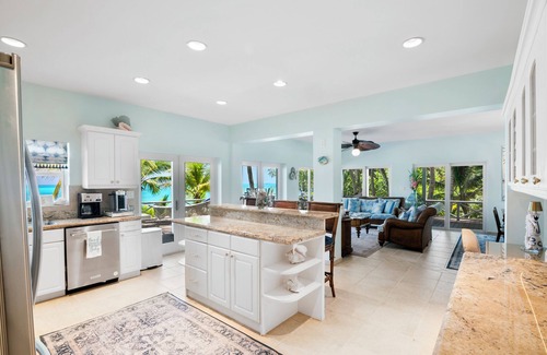 Tar Bay Villa | Zen Exuma: Stunning Beachfront Villa w/NEW Rooftop Lounge, Spa, Cabana & Pool!