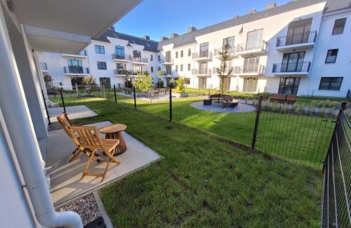 Slupsk Apartment | Zielony apartament w Wileńska Park i prywatne miejsce w garażu podziemnym