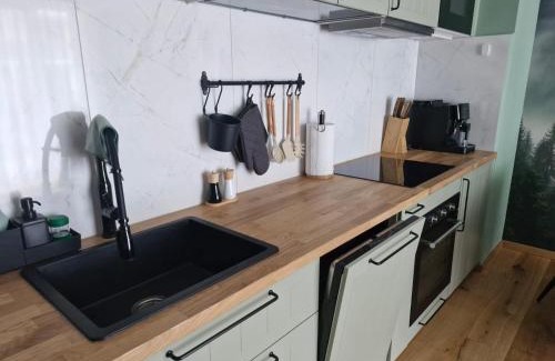 Slupsk Apartment | Zielony apartament w Wileńska Park i prywatne miejsce w garażu podziemnym