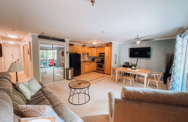 1 Bdrm Lake condo across from Paugus Bay, shopping, pool, & dining!