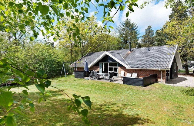 10 person holiday home in Henne
