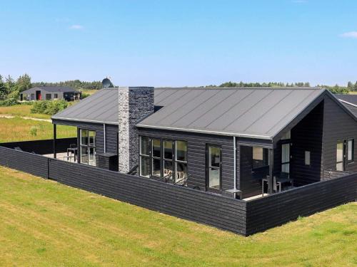 10 person holiday home in L kken
