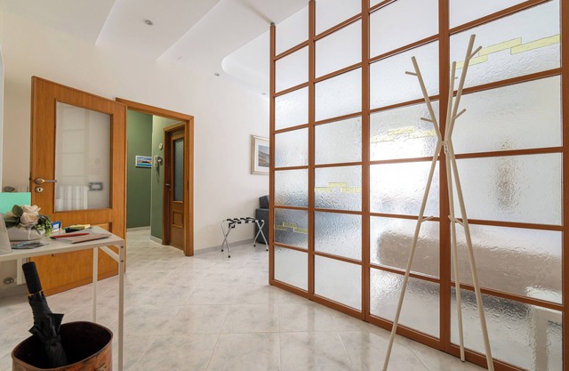 12 minutes from the historic center. 4 Bed 2 Room Apartment Maradona Stadium