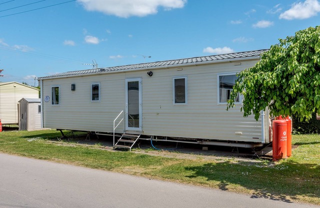 12ft-wide caravan with one double and two twin.