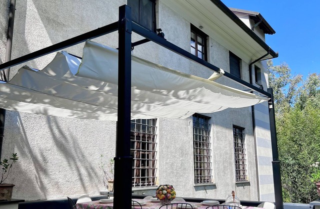 16th-century hunting lodge with pool and garden within a historic private villa