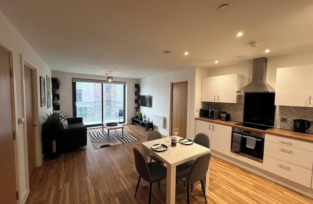 2-bed waterside retreat with gym in the heart of Manchester!
