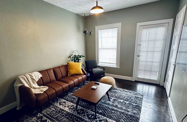 2-bedroom apartment in downtown Elkins with AC, a balcony, and WiFi.