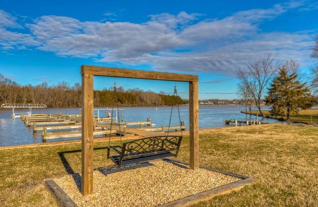 2-level home with gated community water access/boat launch, firepit, & game room