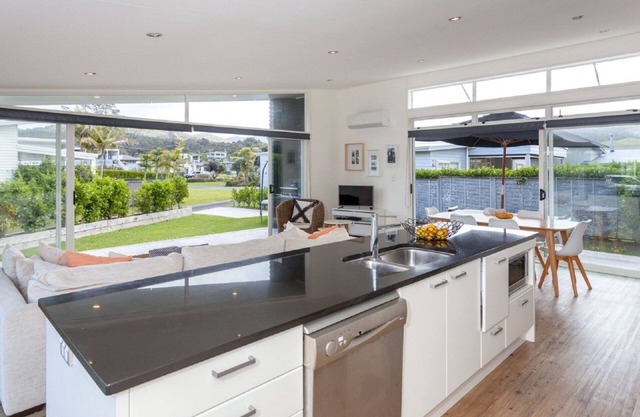 2 minutes toes hit sand! Superb beach house with amazing amenities WIFI!
