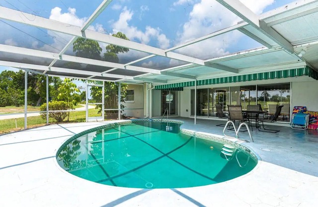 4 bedrooms sleep 8 private heated pool on golf course 4 mil to the beach