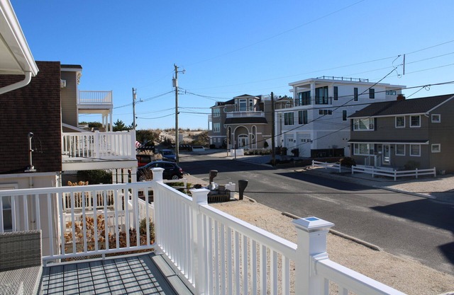 4 Houses to THE BEACH! Completely renovated Duplex- 1st Floor- WALK TO ALL!
