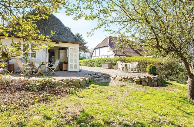 4 person holiday home in Grenaa