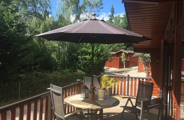 4 star Lakeside Pine Lodge/Cabin (sauna) in secluded Shropshire setting
